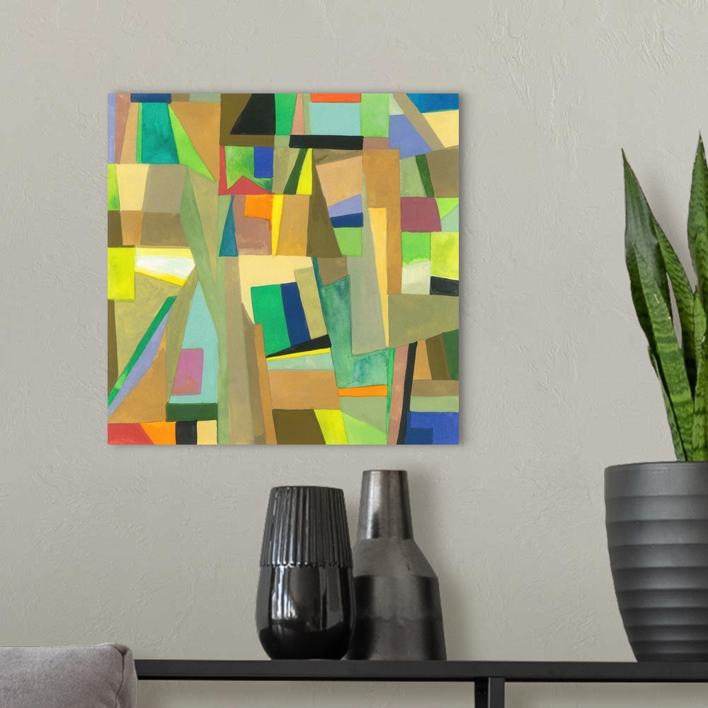 A modern room featuring One painting in a series of geometric abstracts in various colors depicting the artist's interpre...