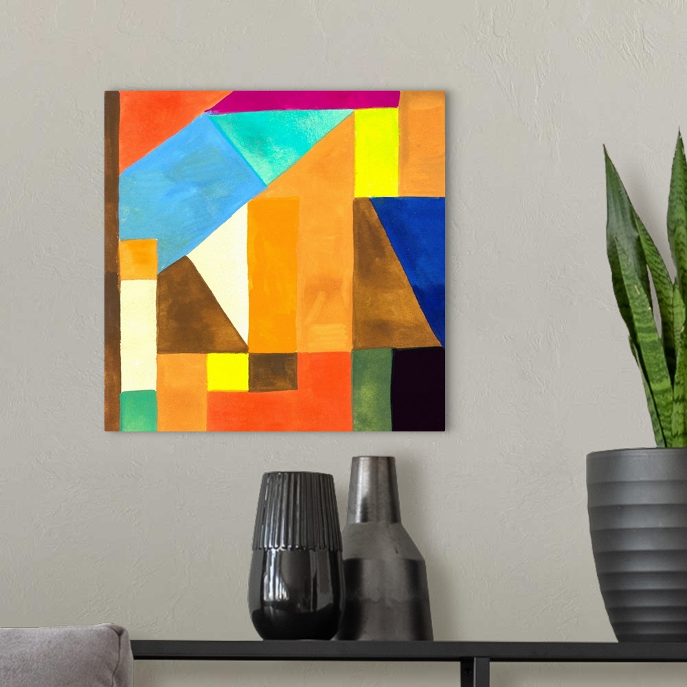 A modern room featuring Abstract painting of a variety of angular shapes in bright colors constructed together.
