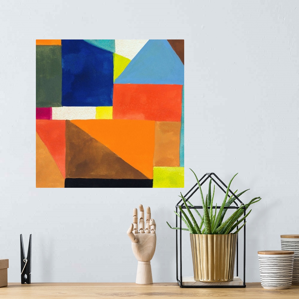 A bohemian room featuring Abstract painting in bright colors (predominantly orange and blue) with angular, geometric shapes
