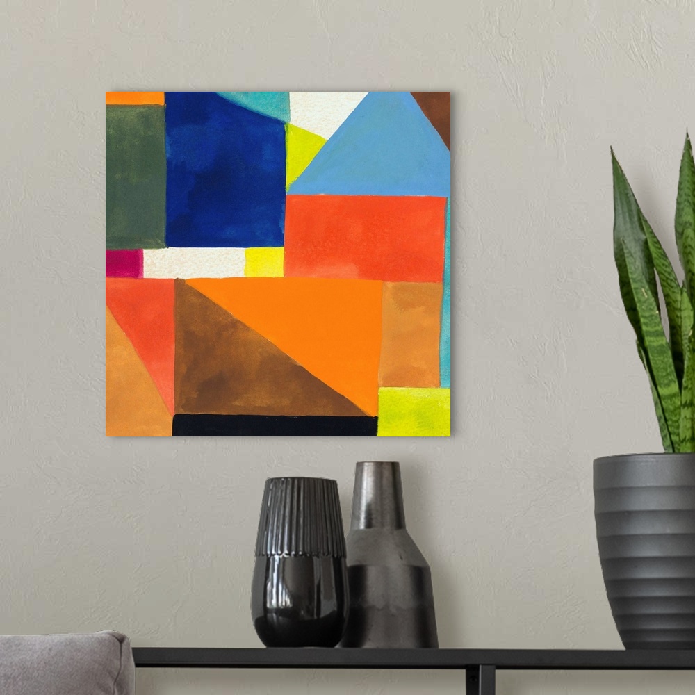 A modern room featuring Abstract painting in bright colors (predominantly orange and blue) with angular, geometric shapes