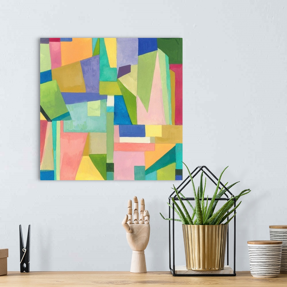 A bohemian room featuring One painting in a series of geometric abstracts in vibrant colors depicting the artist's interpre...