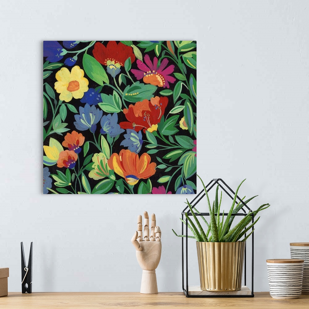 A bohemian room featuring Painting of warm-colored flowers and green leaves against a black background.