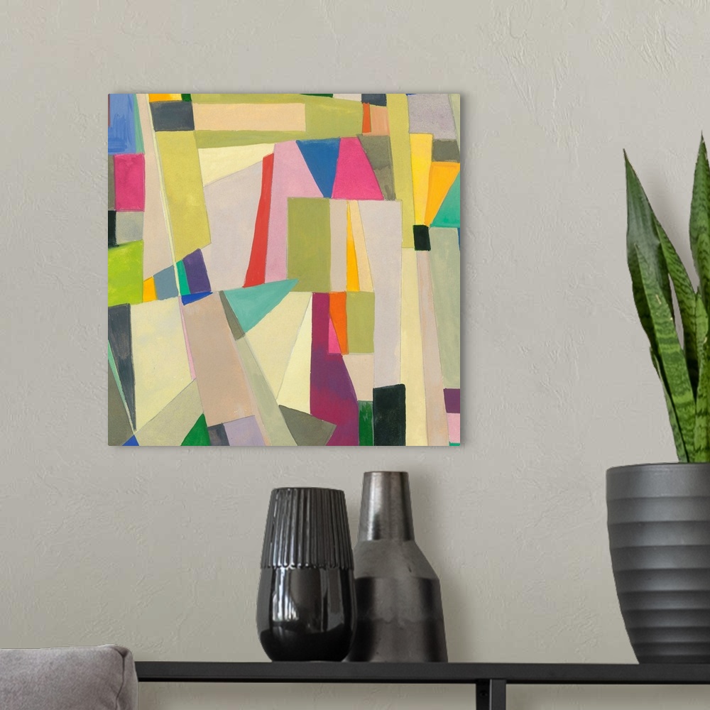 A modern room featuring One painting in a series of geometric abstracts with some subdued colors depicting the artist's i...