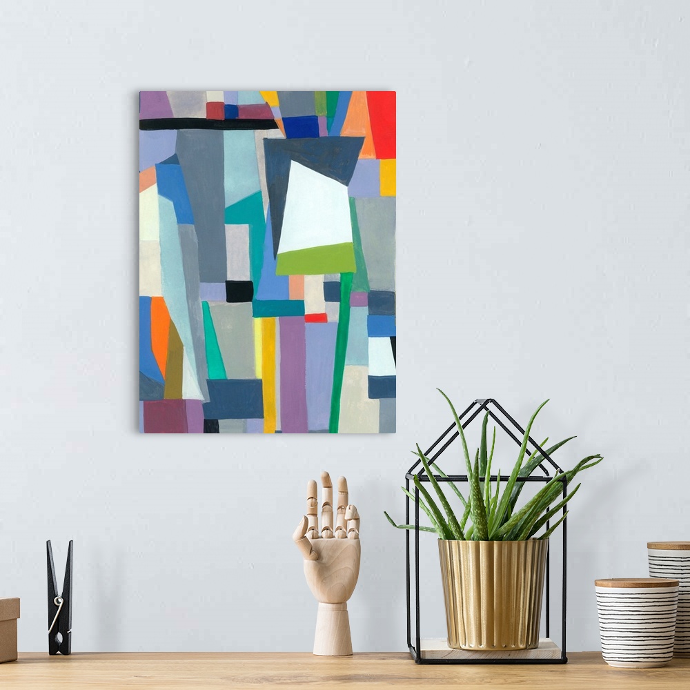 A bohemian room featuring One painting in a series of geometric abstracts with mostly cool colors depicting the artist's in...
