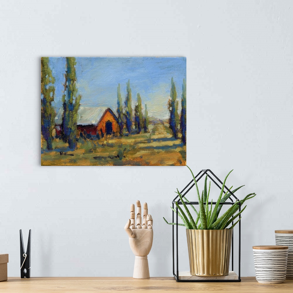 A bohemian room featuring A contemporary painting of a country road nearby a building lined with trees.