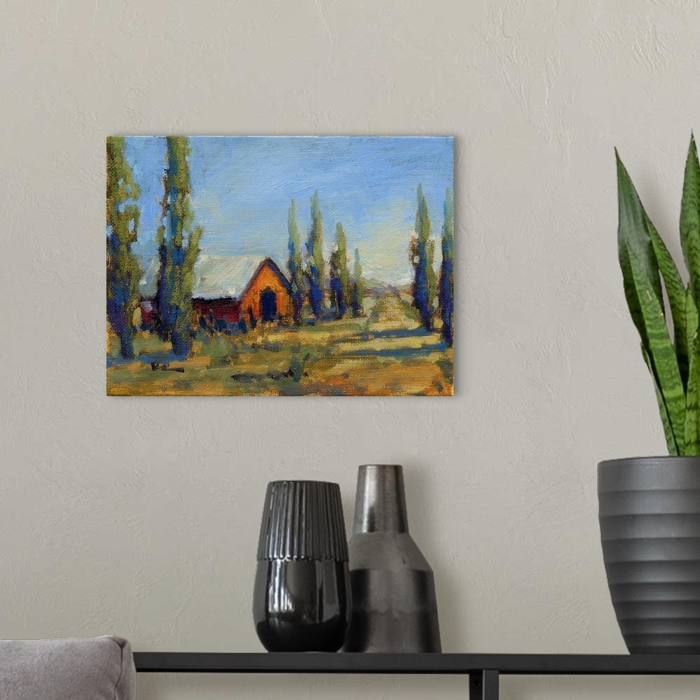 A modern room featuring A contemporary painting of a country road nearby a building lined with trees.