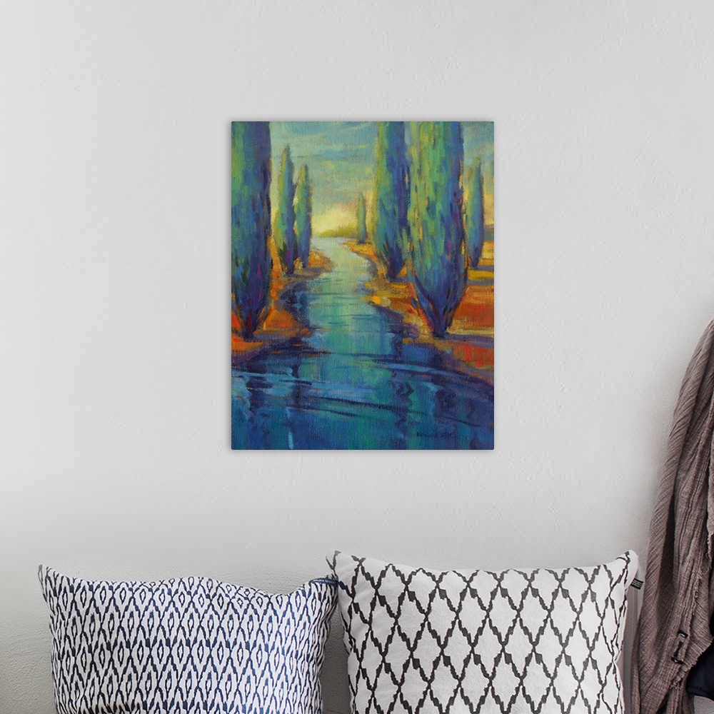 A bohemian room featuring A vertical contemporary painting of a river framed by cypress trees.
