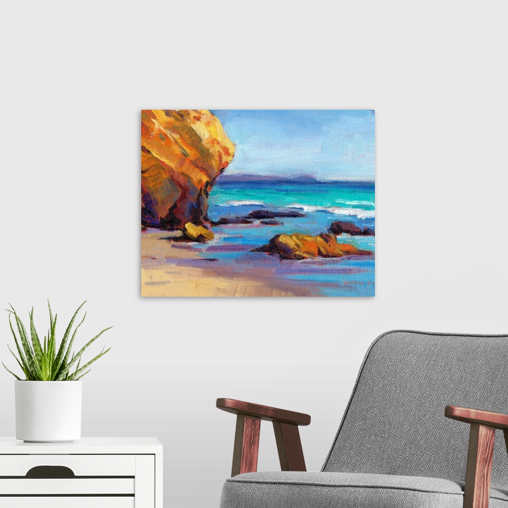 A modern room featuring Contemporary painting of a rocky beach with vivid blue water.