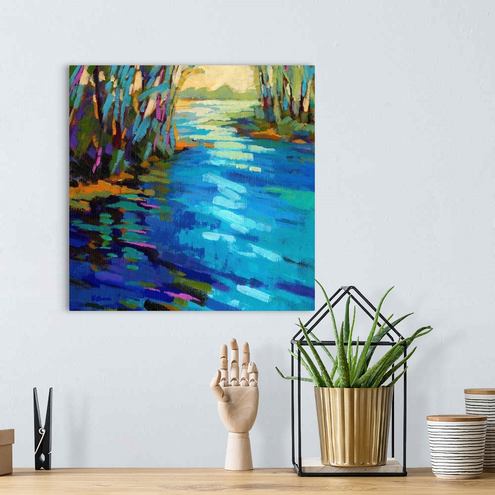 A bohemian room featuring A contemporary abstract painting in colorful brush strokes of a river framed by trees.