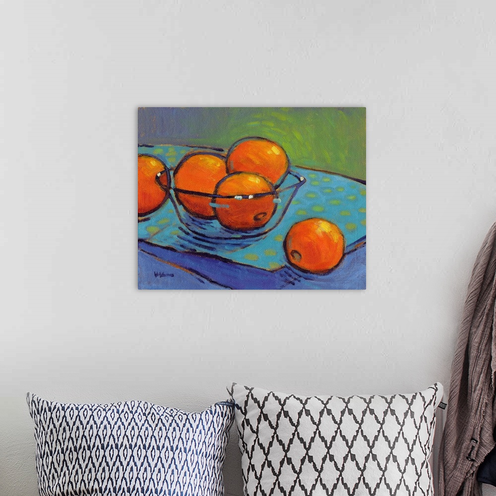 A bohemian room featuring A contemporary abstract painting of a bowl of oranges in vibrant colors.