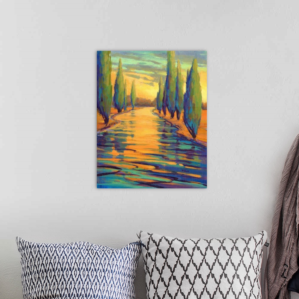 A bohemian room featuring A contemporary abstract painting in colorful brush strokes of a river framed by trees.