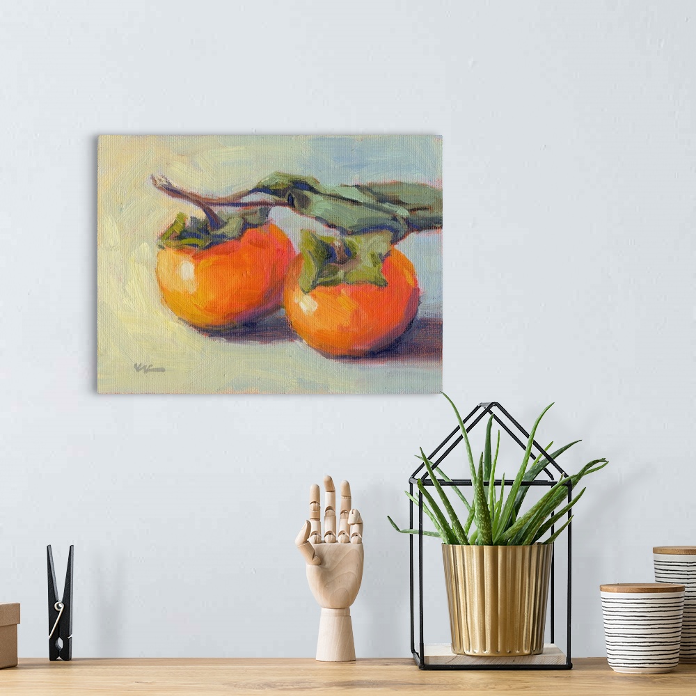 A bohemian room featuring A horizontal painting of a pair of persimmons.