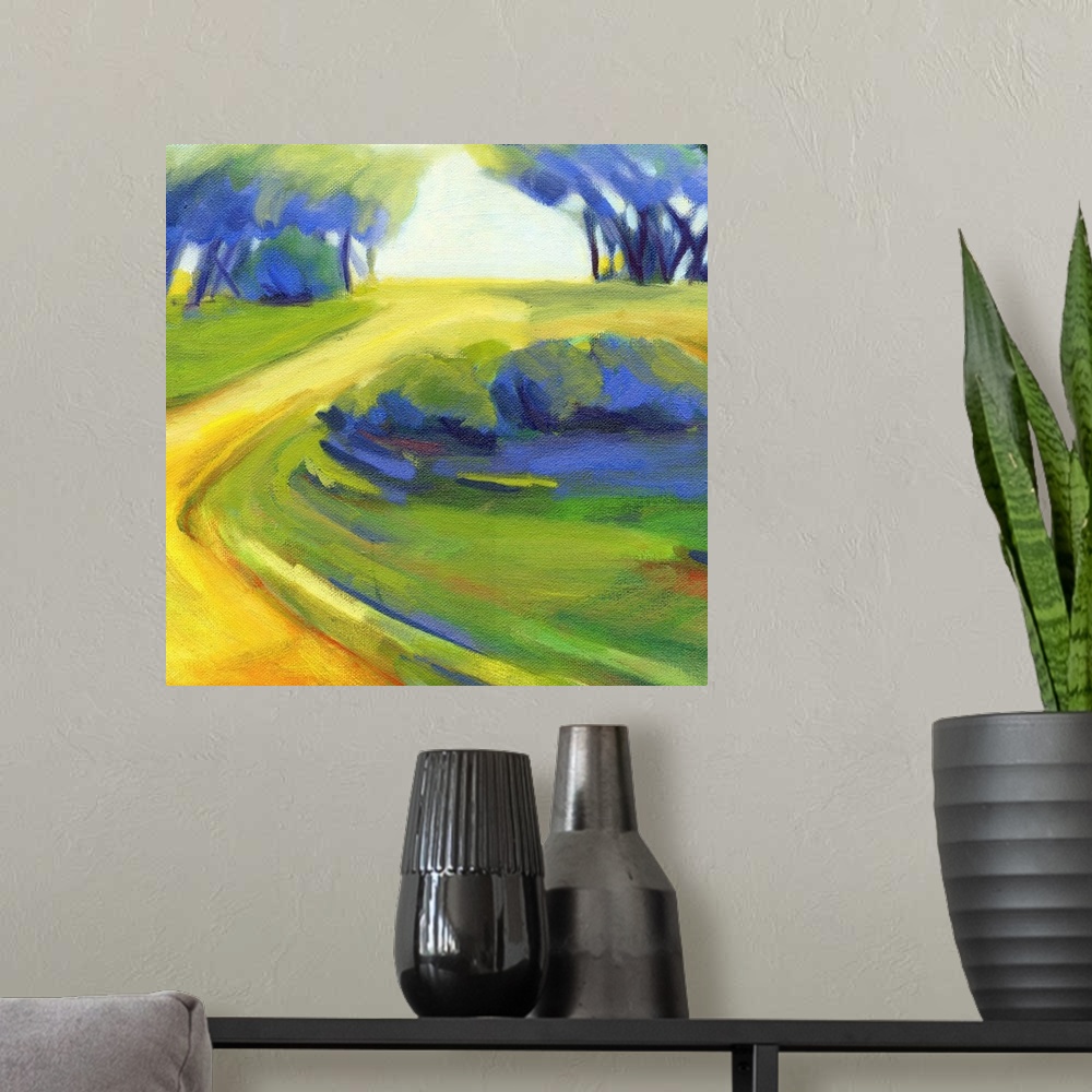 A modern room featuring A square painting of a winding road in the countryside.