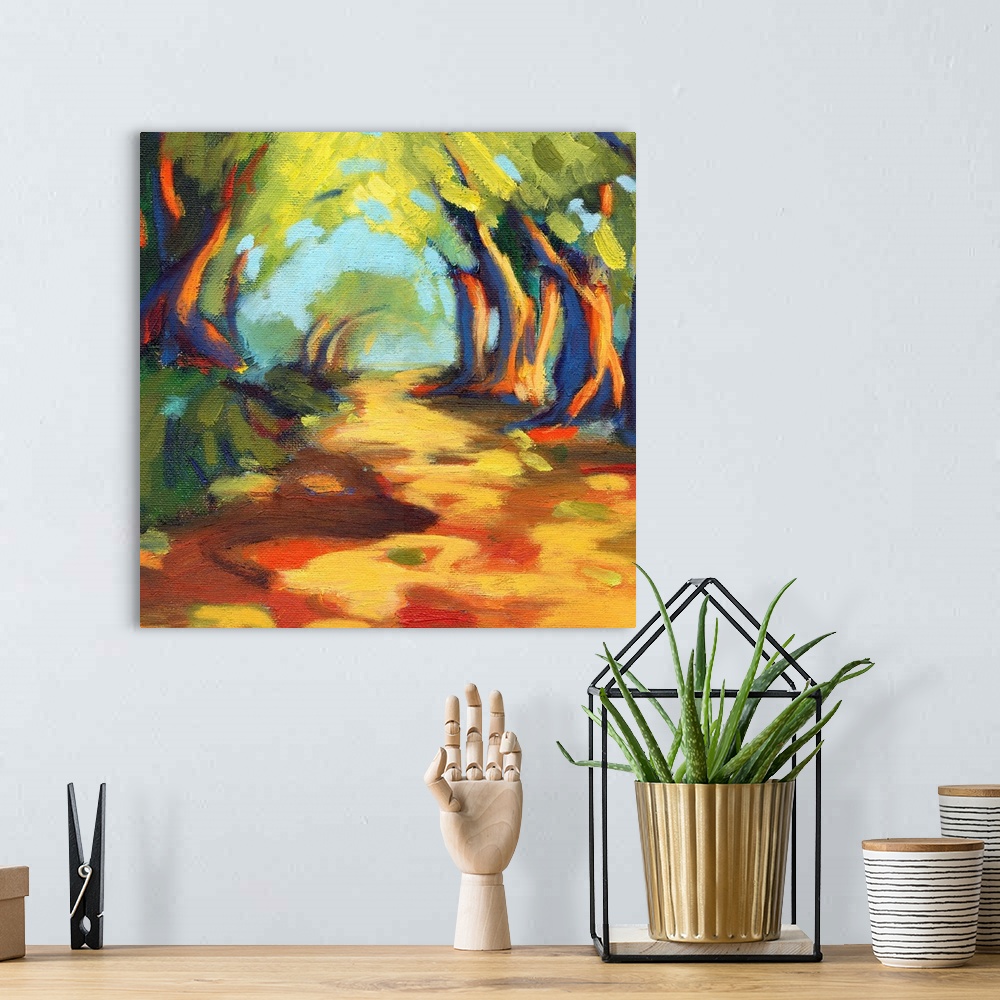 A bohemian room featuring A contemporary painting of a rugged road framed by trees.