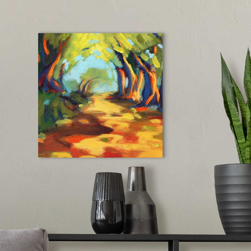 A modern room featuring A contemporary painting of a rugged road framed by trees.