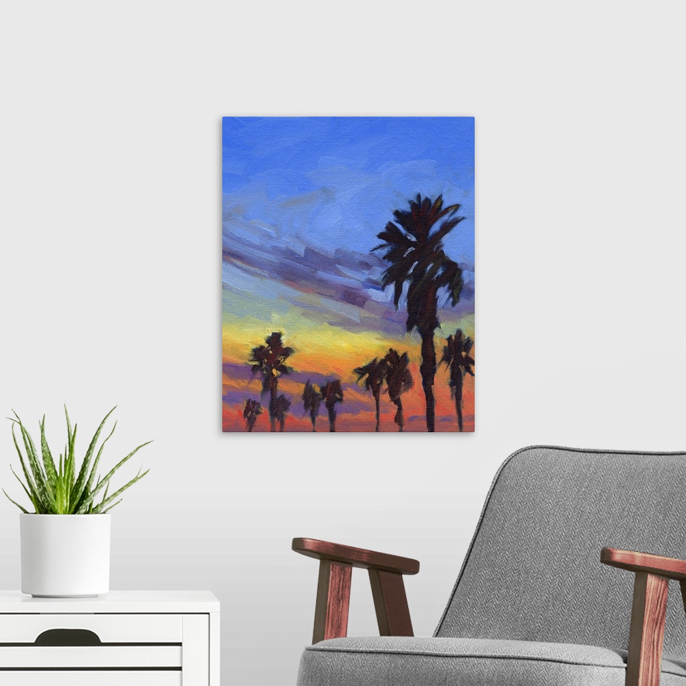 A modern room featuring A vertical painting of palm trees during a sunset.
