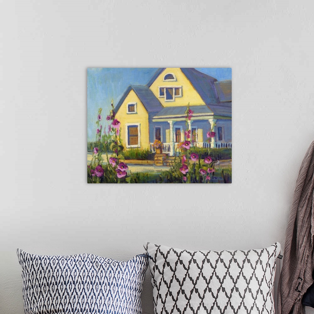 A bohemian room featuring A contemporary painting of a yellow house with pink flowers in a garden.