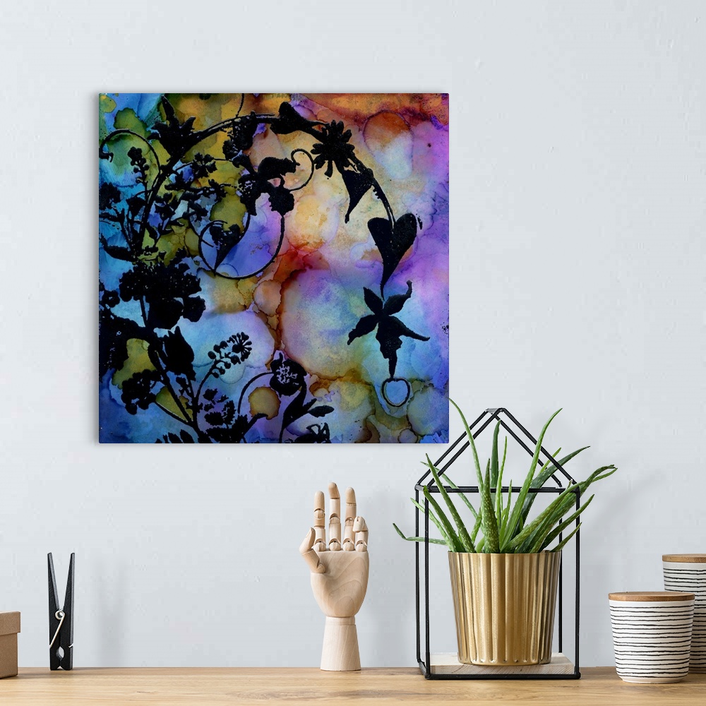 A bohemian room featuring Square painting of flowery vines against a multicolored watercolor background.