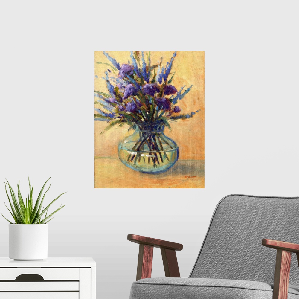 A modern room featuring A vertical contemporary painting of a glass vase of eloquent summer flowers.