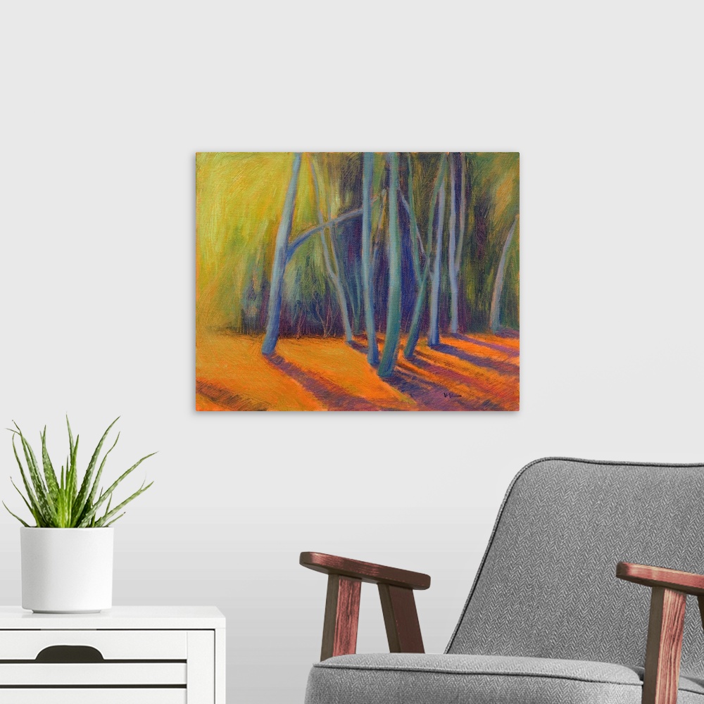 A modern room featuring A multicolored painting of a forest of trees.
