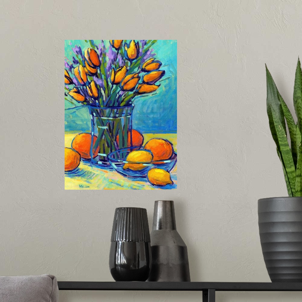 A modern room featuring A vertical contemporary painting of a glass vase of tulips with oranges and lemons.