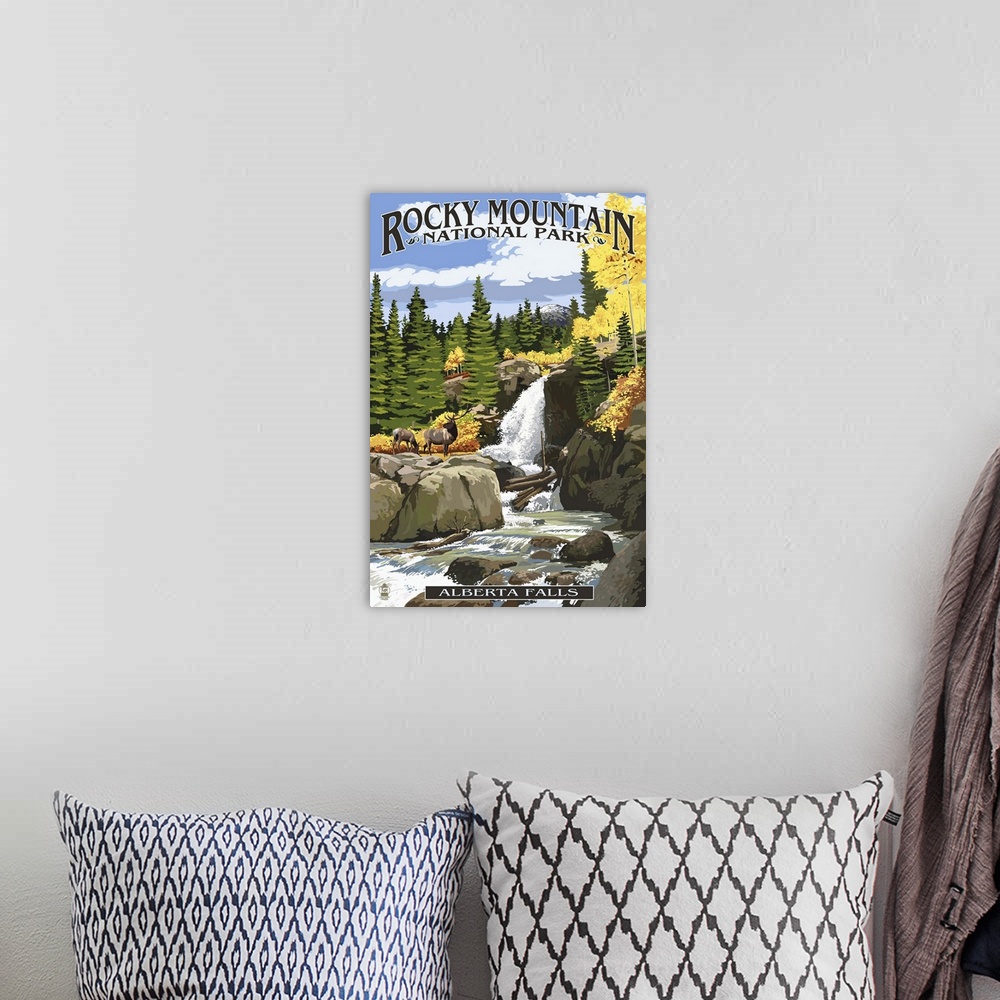 A bohemian room featuring Retro stylized art poster of a wilderness scene with with a rocky waterfall, and surrounding trees.