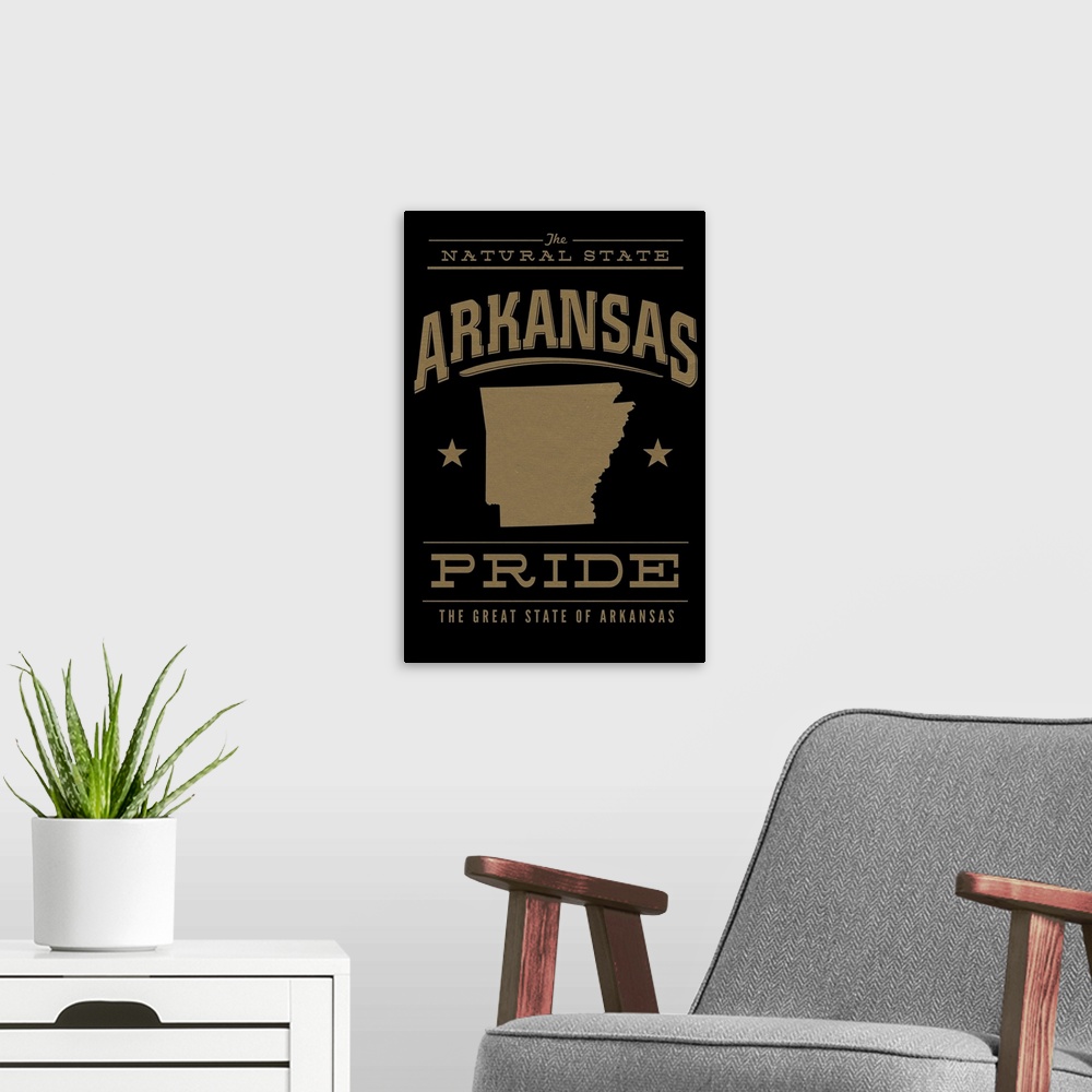 A modern room featuring The Arkansas state outline on black with gold text.