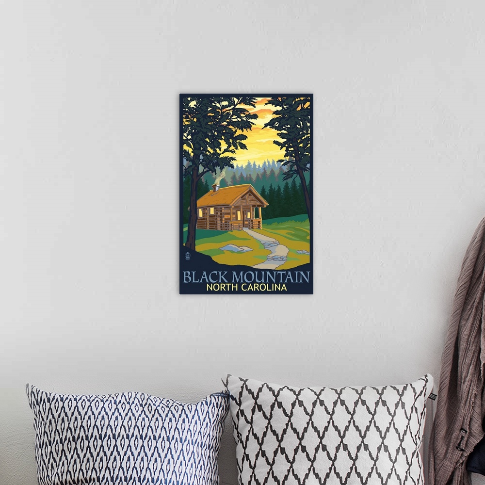 A bohemian room featuring Retro stylized art poster of a cabin with smoke billowing out the chimney, in a forest.