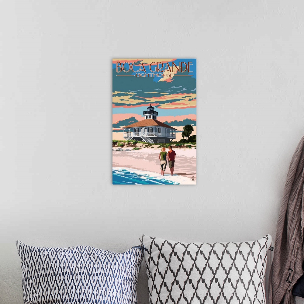 A bohemian room featuring Stylized art poster of a couple walking up the shore of a sandy beach towards a lighthouse.