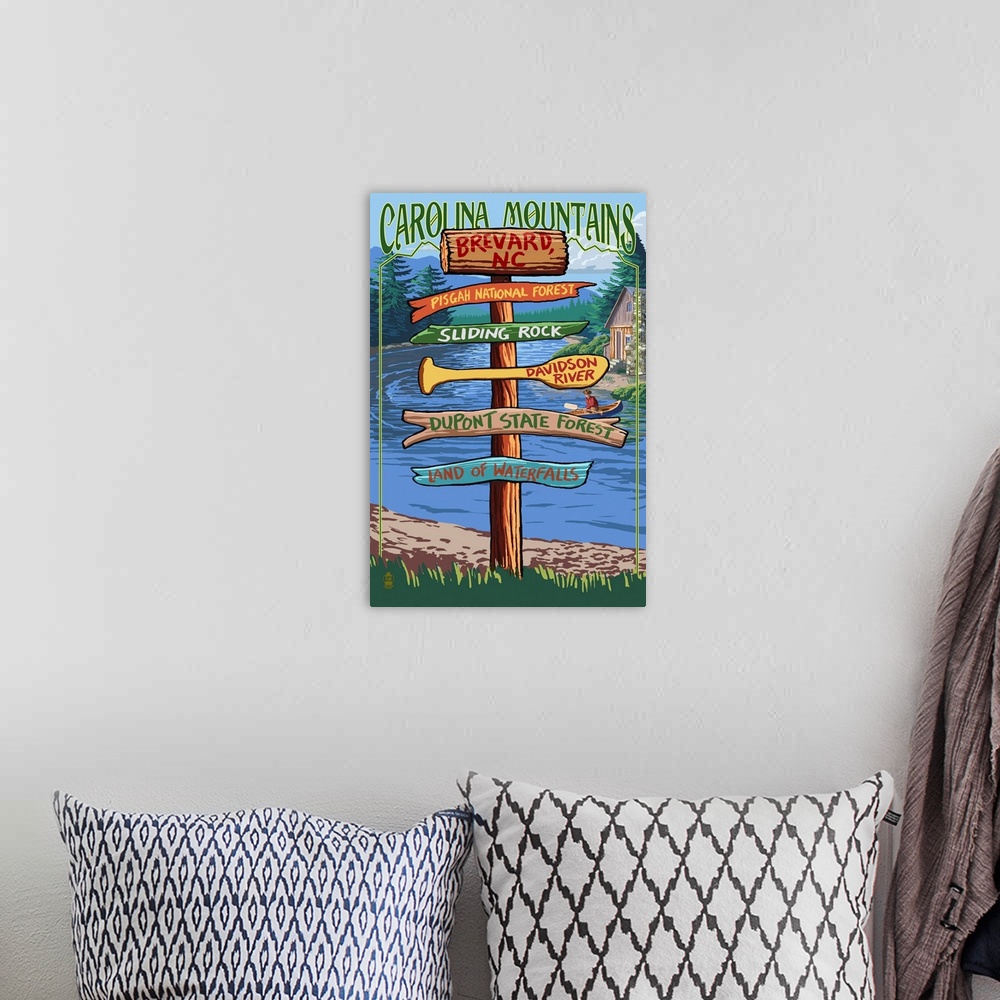 A bohemian room featuring Retro stylized art poster of a sign post giving different directions.
