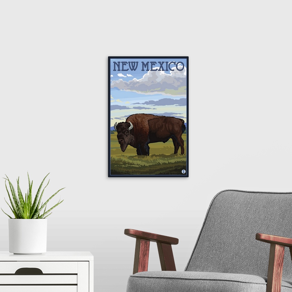 A modern room featuring Retro stylized art poster of a bison on the plains, with clouds in the sky overhead.