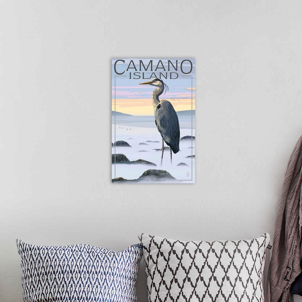 A bohemian room featuring Retro stylized art poster of a blue heron standing in hazy rocky landscape.
