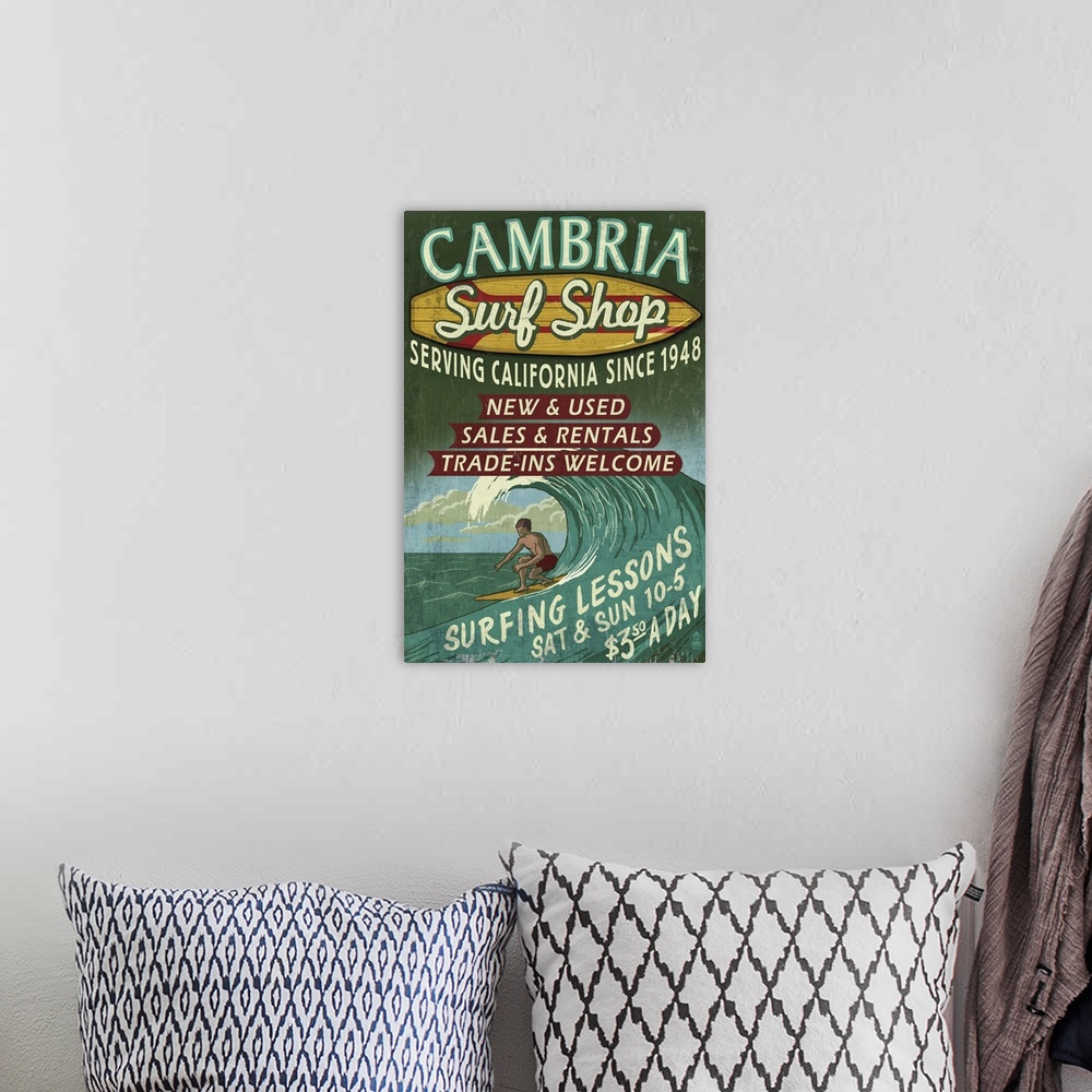 A bohemian room featuring Cambria, California - Surf Shop Vintage Sign: Retro Travel Poster