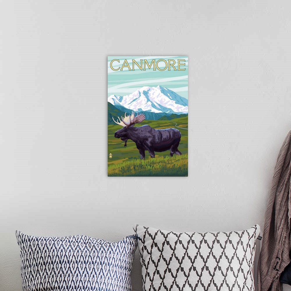 A bohemian room featuring Retro stylized art poster of a moose in the wilderness. With large snow covered mountains in the ...