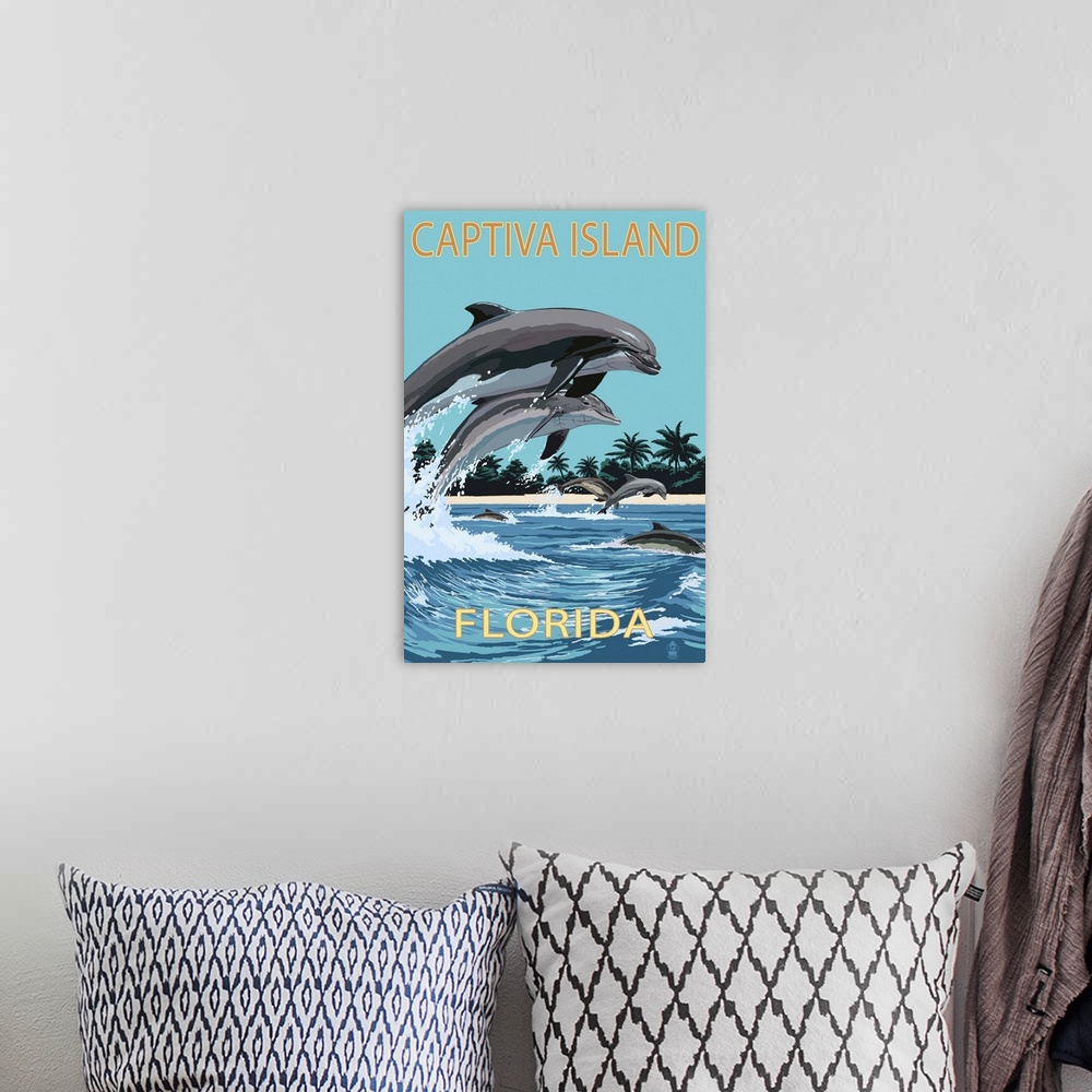 A bohemian room featuring Captiva Island, Florida - Dolphins Swimming: Retro Travel Poster