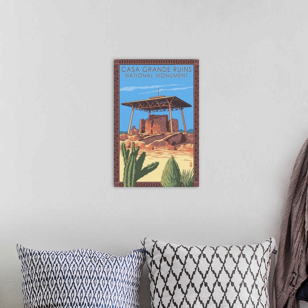 A bohemian room featuring Casa Grande Ruins National Monument - Arizona: Retro Travel Poster