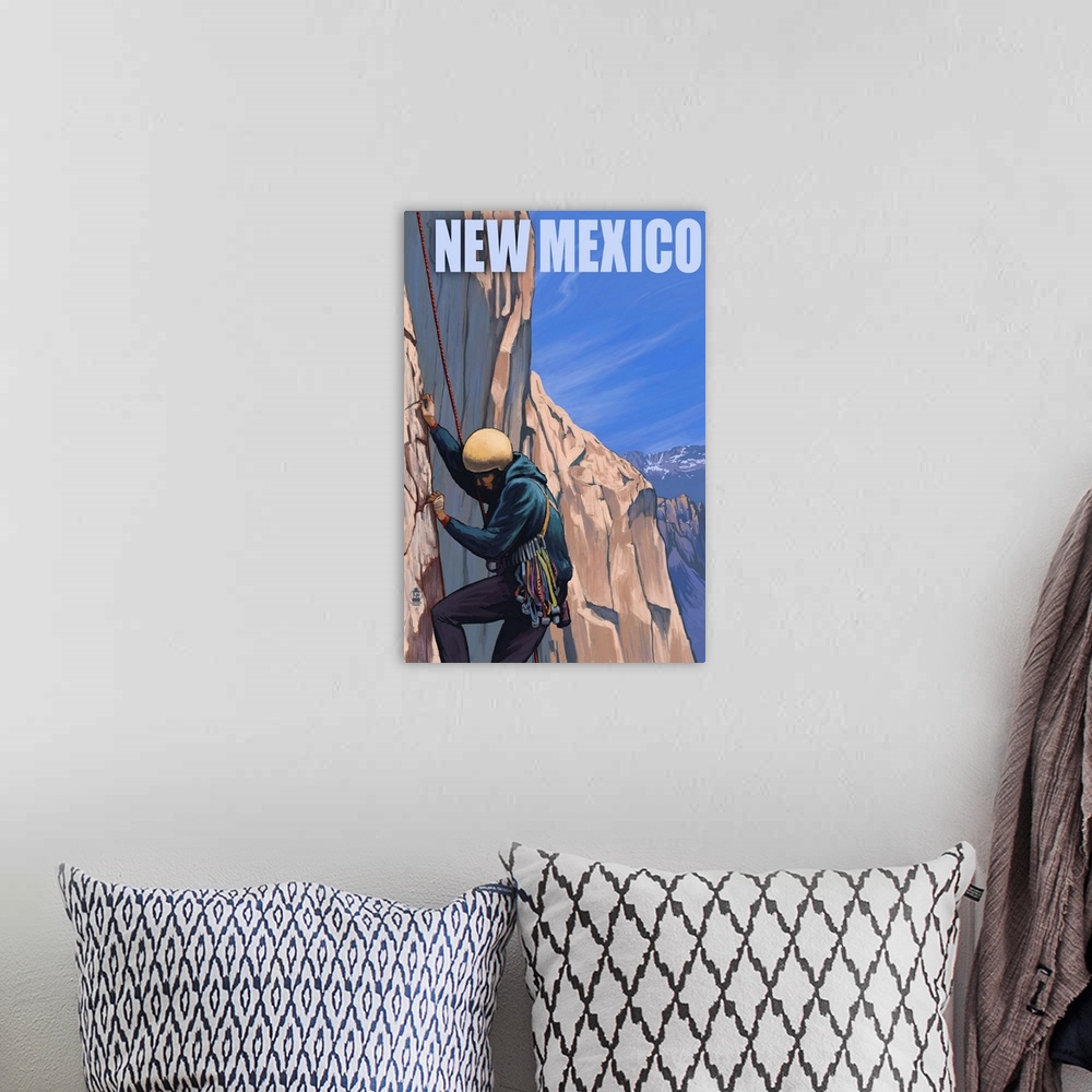 A bohemian room featuring Retro stylized art poster of a rock climber scaling a rocky cliff.
