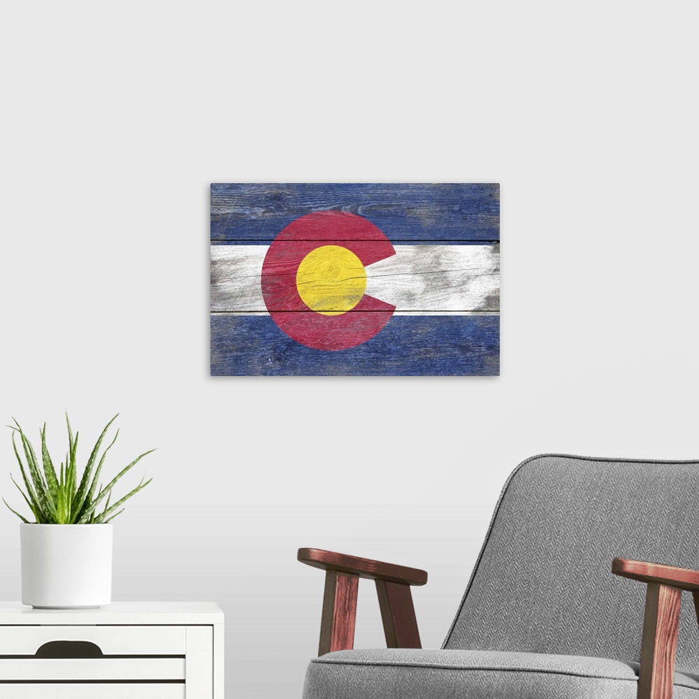 A modern room featuring The flag of Colorado with a weathered wooden board effect.