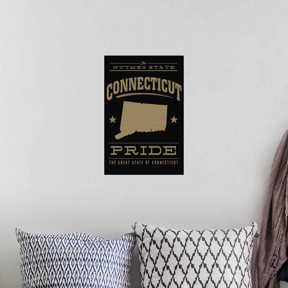 A bohemian room featuring The Connecticut state outline on black with gold text.