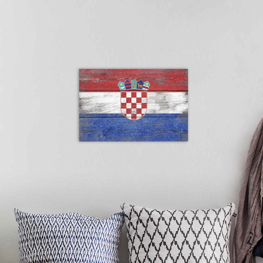 A bohemian room featuring The flag of Croatia with a weathered wooden board effect.
