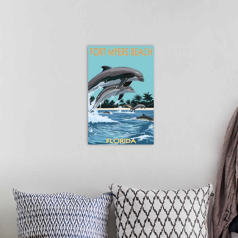 A bohemian room featuring Retro stylized art poster of a mother and calf dolphin leaping out of the water in unison.