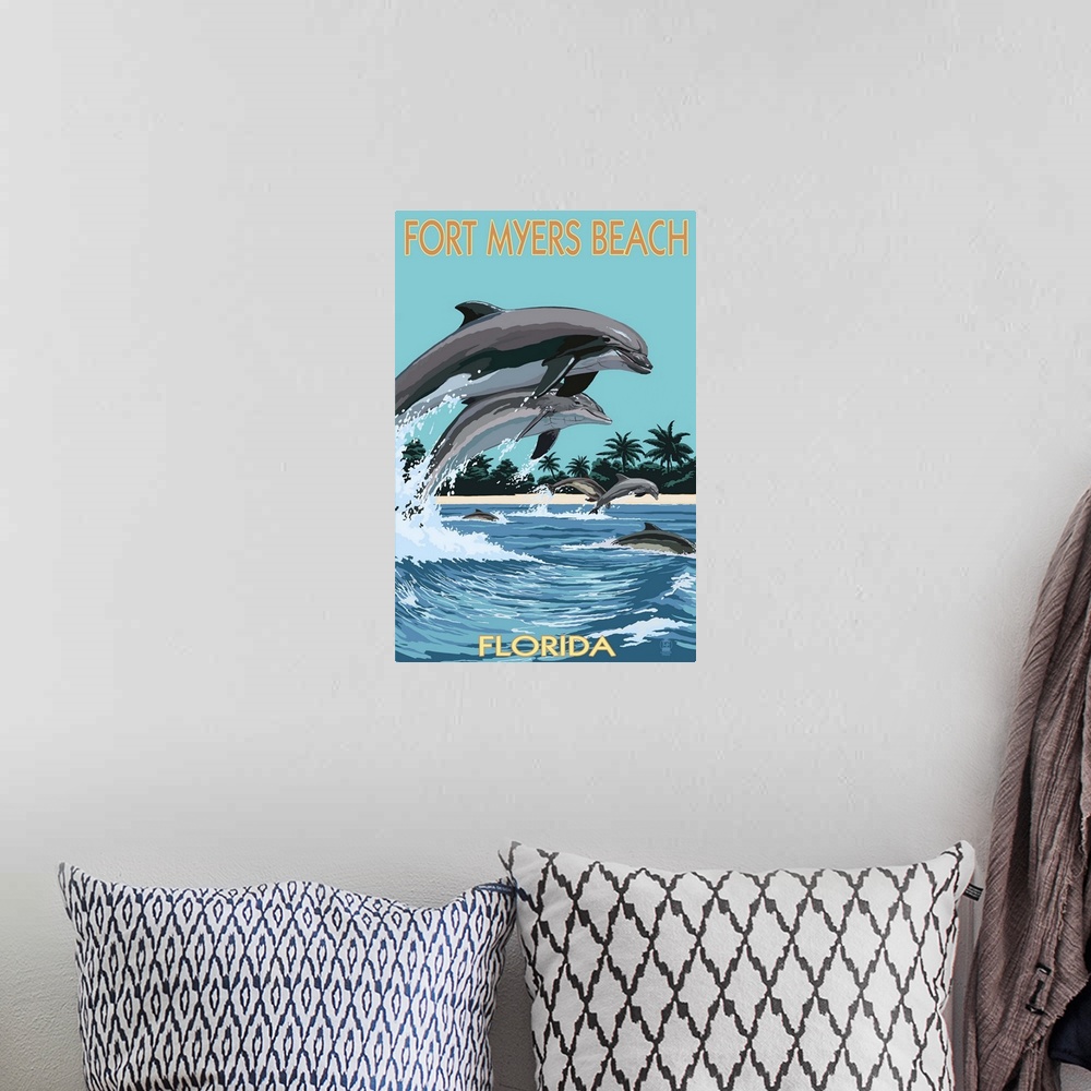 A bohemian room featuring Retro stylized art poster of a mother and calf dolphin leaping out of the water in unison.