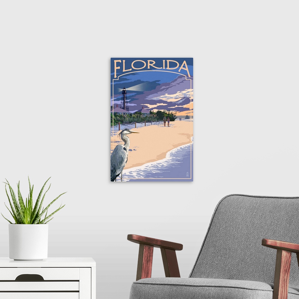 A modern room featuring Retro stylized art poster of a blue heron on a beach, with a lighthouse in the background.