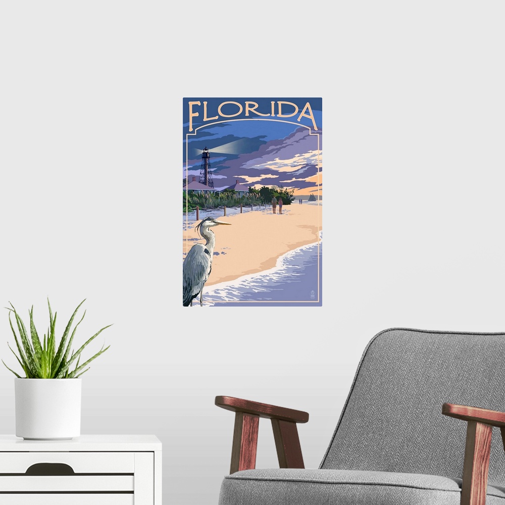A modern room featuring Retro stylized art poster of a blue heron on a beach, with a lighthouse in the background.