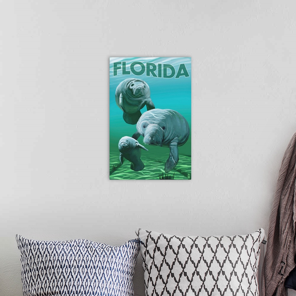 A bohemian room featuring Retro stylized art poster of manatees floating in a gentle green sea.