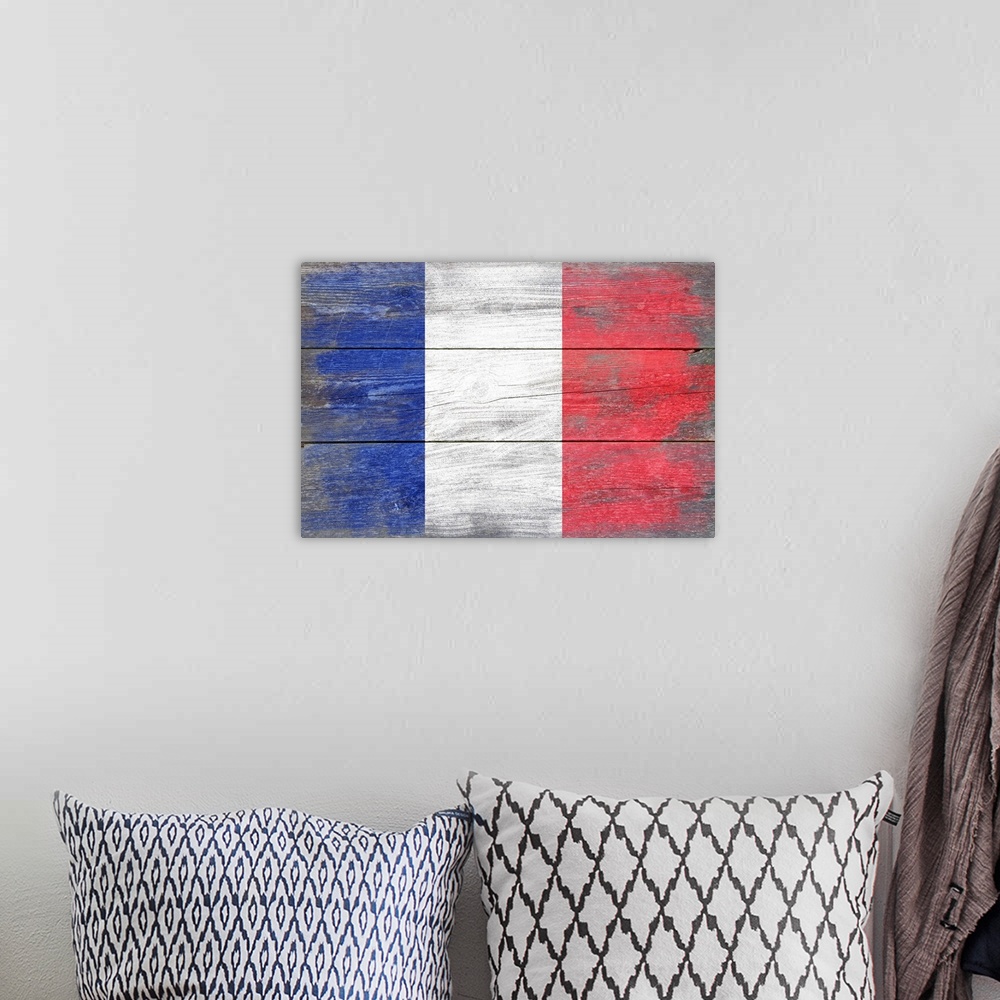 A bohemian room featuring The flag of France with a weathered wooden board effect.