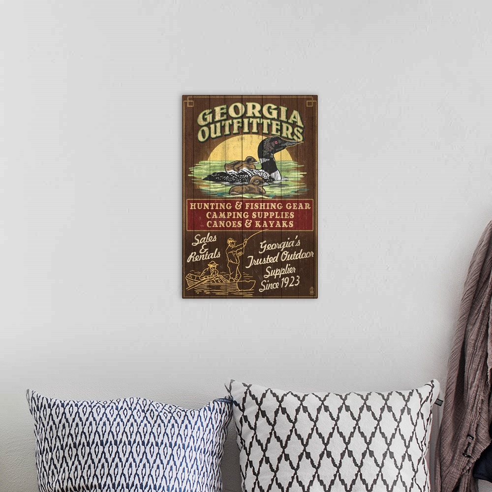 A bohemian room featuring Retro stylized art poster of a vintage sign with a mother loon and her ducklings.