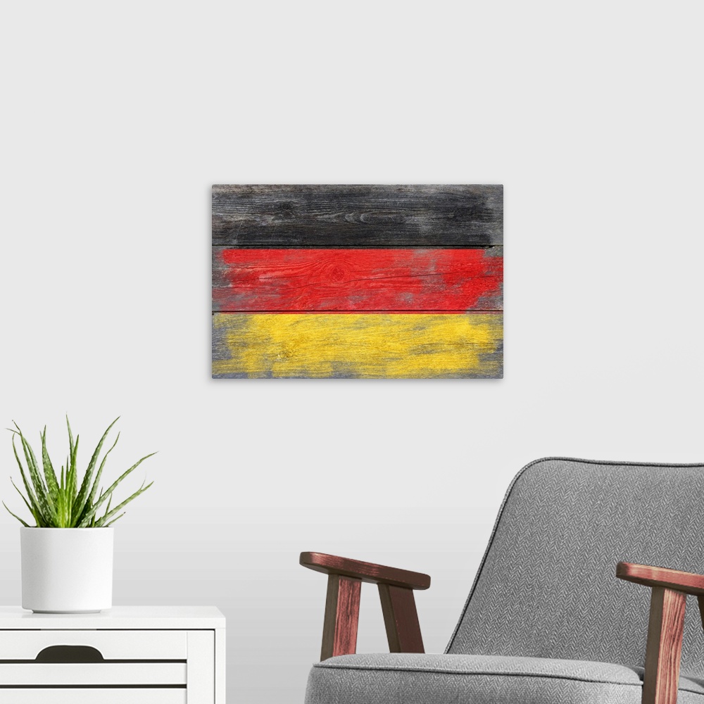 A modern room featuring The flag of Germany with a weathered wooden board effect.