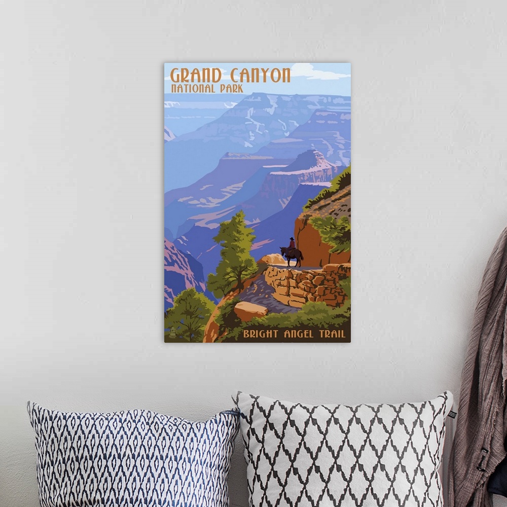 A bohemian room featuring Retro stylized art poster of a hazy view of a massive canyon.