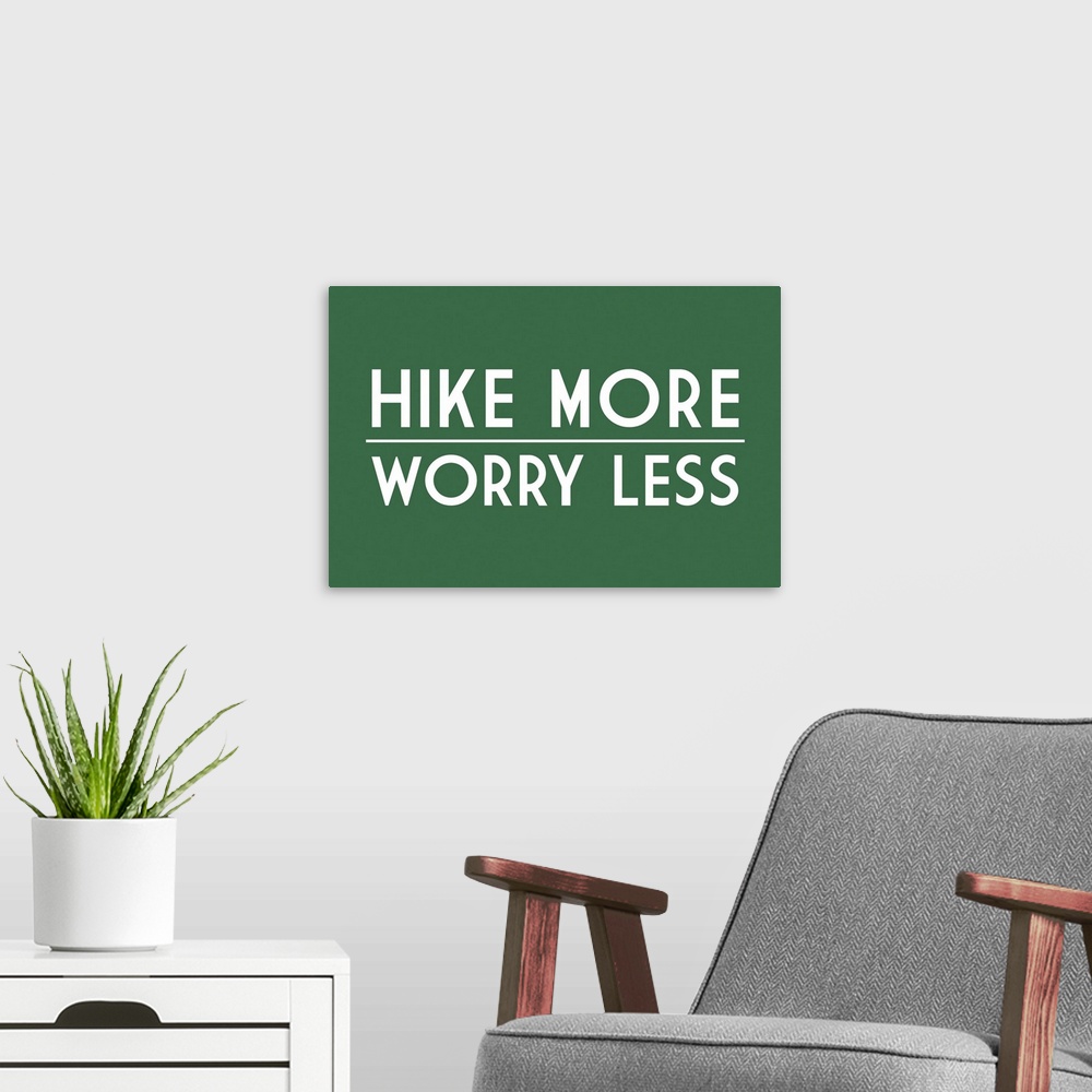 A modern room featuring Hike More, Worry Less